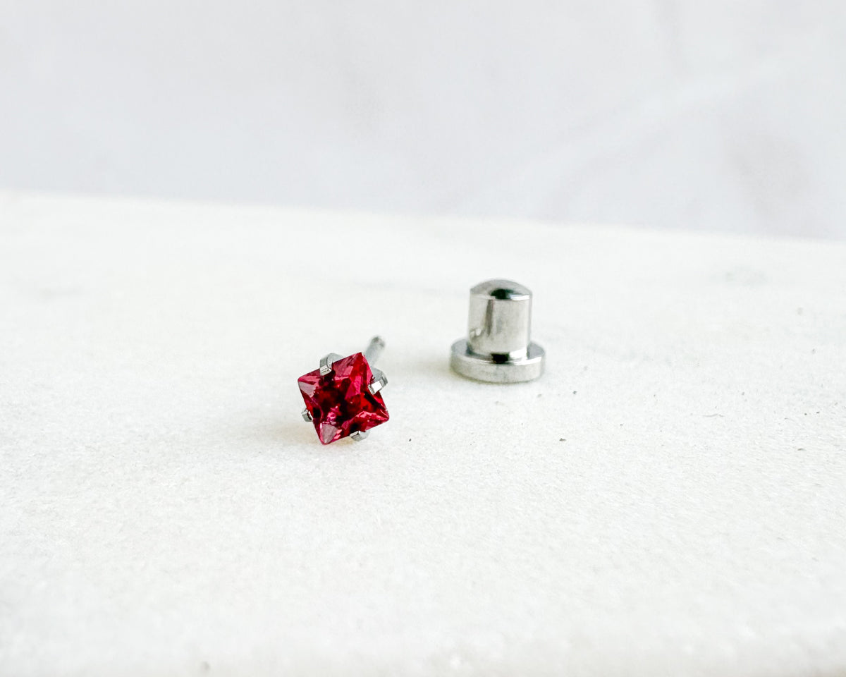 PIERCING EARRINGS – P306 Red 3mm CZ Square (Titanium)